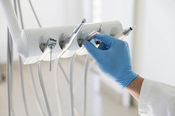 Professional Invisalign Clear Aligners technician working in DeLisle, MS